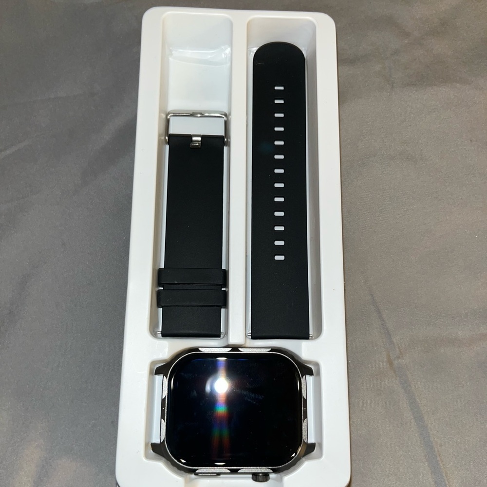 Black Smartwatch and Phone Case